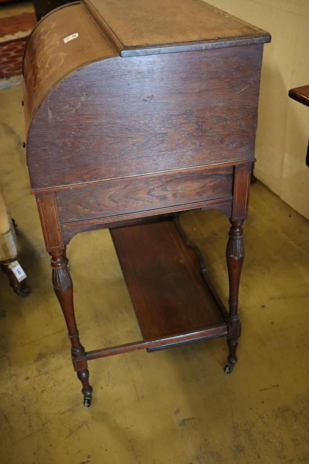 An Edwardian marquetry inlaid rosewood cylinder bureau, width 69cm